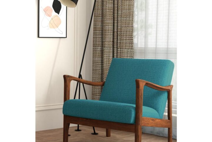 The Zephyr Slate Lounge chair features a solid wood frame. Its comfortable foam padded seat and durable turquoise fabric upholstery makes it perfect for leaning into a boisterous conversation or reading your favorite book.  Add the matching footrest and quietly contemplating your next move. With a warm Medium Brown finish