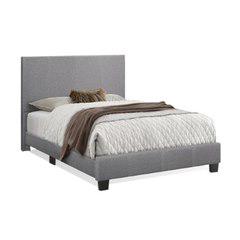 This platform bed features clean lines and contrast stichted design that grounds your bedroom with a modern look. The engineered wood frame is built on tapered legs with a sleek black finish