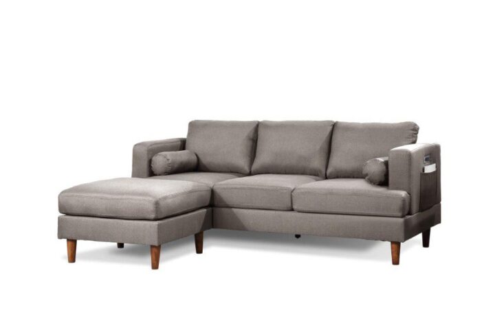 This sofa-and-chaise sectional grounds your living room in a contemporary look. The included ottoman moves to either side of the sofa