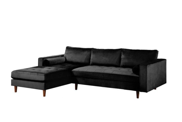 Make a stylish statement in the living room with this modern sectional. This sectional is covered in a thick Velvet like fabric for durability and style. It's made of solid and manufactured wood