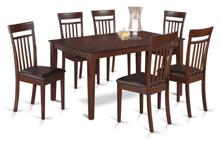 Capri dining table sets give your dining room modern refinement with an exquisite and smart artistic style. This particular Capri table and cushioned dining room chair features a solid top for an exquisite