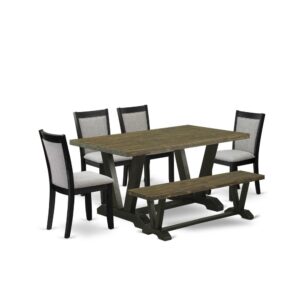 Our kitchen dining set includes 4 mid century dining chairs