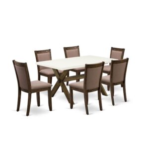 Our dinner table set adds a touch of elegance to any dining room that you and your family will absolutely enjoy. The elegant 7 Piece modern dining set includes a rectangular table and 6 modern dining chairs. This rectangular dining room table top is offered in a Distressed Jacobean finish. In addition