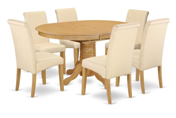 Give your room decor a new and polished look with this modern 7 Piece AVBA7-OAK-02 Dining Set. The Beveled oval table offers a rich fantastic Oak color to enhance any kind of living area or home's kitchen for any occasions. A thick curled ornate pedestal base provides strength and state-of-the-art impression to the round dining room tables. This valuable oval dining table will bring the room together as it draws in with is glossy design. The barry upholstered dining chair is elegant & classic in design
