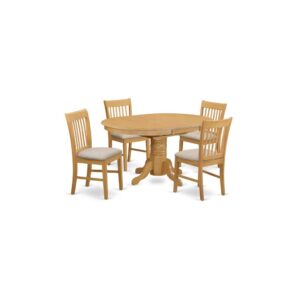 The dinette table set is a 5-piece set of spectacular kitchen table with a stronger carved pedestal support. The Beveled oval table completes with four long lasting kitchen dining chairs that create cozy and comfortable kitchen space environment. The whole 5-piece Dining table set material is wood with a perfect Oak finish; the kitchen chairs offer classy carvings with Linen upholstery providing sufficient support