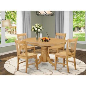 The dinette table set is a 5-piece set of gorgeous small kitchen table with a stronger carved pedestal support. The Beveled oval table completes with four robust dining chairs that create warm and comfortable kitchen space environment. The whole 5-piece table and chairs set material is wood with a fancy Oak finish; the dining chairs offer sophisticated carvings with microfiber upholstery providing sufficient support