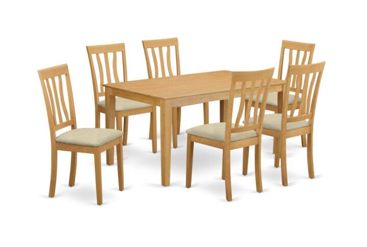 This amazing simple but alluring 7 piece table and chairs set will add warmth and style to your dining space. It includes a dinette table and 6 beautifully crafted kitchen dining chairs. The Dinette set can seat a maximum of six people. This set is manufactured out of the popular Asian Hardwood