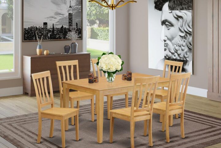 This amazing simple but charming 7 piece dining room table set will add ambiance and style to your dining-room. It contains a dining table and 6 beautifully crafted dining room chairs. The Dining room set can seat a maximum of six people. This set is created out of the popular Asian Hardwood