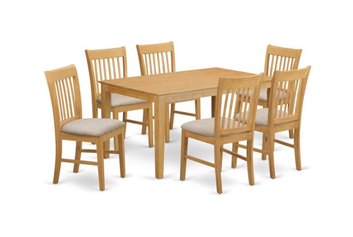 This particular simple but unique 7 piece table set will bring warmth and style to your dining space. It features a dinette table and 6 beautifully crafted dinette chairs. The Dinette set can seat a maximum of six people. This set is created out of the popular Asian Hardwood