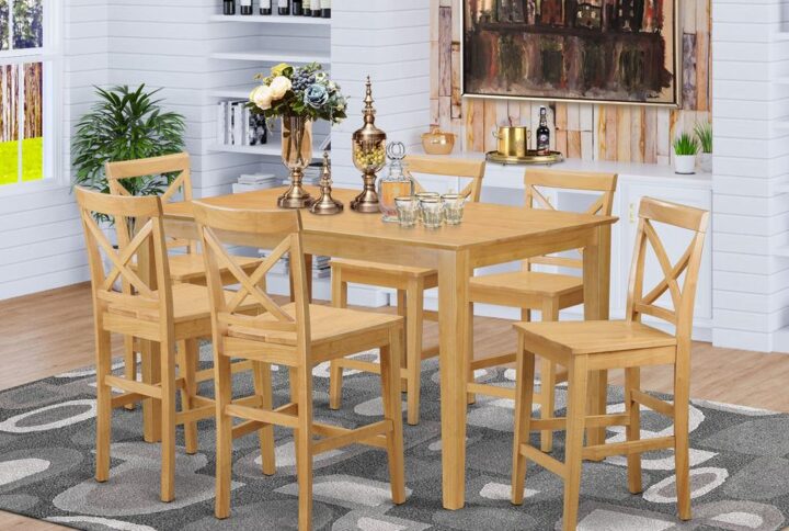 Beautify your kitchen space or counter height with our contemporary best quality Rubberwood counter height set created for long-lasting use. This Counter Height set comes in a rich Oak finish. This excellent classy counter height Counter height setincludes 1 kitchen table and six armless dining chairs. The table comes with a Bevel-shaped top with four legs at each corner and without leaf. Each chair has four legs at each corner linked together and comes with a distinctively simple wooden surface. The whole set is a combination of simpleness and modern style. It’s very easy to sustain and can readily combine with many decors.