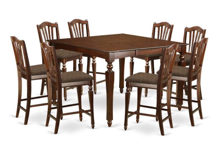 This counter height dining set is highlighted by a striking Mahogany finish and padded seats. The square pub table stores an accessible expansion leaf extension to increase the pub table top space and fold and hide itself away to save precious space. The well produced counter height stool feature style and comfort with enchanting fluted legs and accommodating stretchers for footrests. These slat back bar stools are ideal to loosen up and appreciate your meals. This counter height dining set will improve dining space around it and it will become the center of every social engagement that you have in your house.