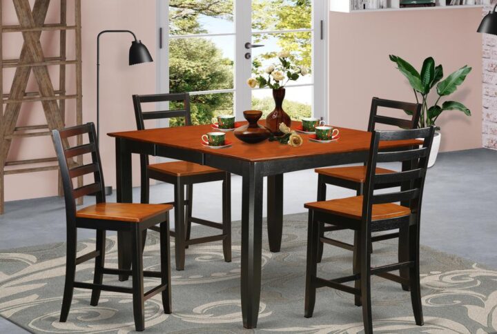 Counter height pub sets provides a classic style that has square counter height table and chairs which feels right at home in either a working kitchen or standard dining area. Dining room table and chairs have a smooth stylish look combined with beveled edges. Pleasantly seat your invited guests with the kitchen table built-in self storing expansion leaf. Square gathering table is fastened to four reliable corner posts for great amount of leg room. Bar stools provide ladder back styling combined with sleek and calming wood seats. Finished in rich Black & Cherry color.