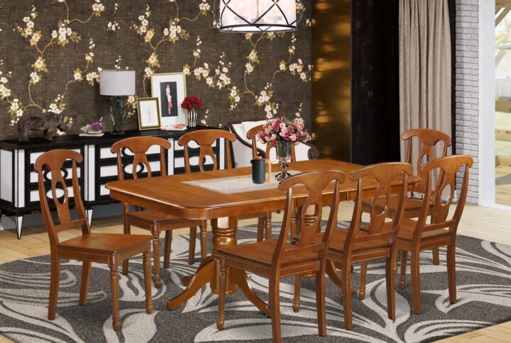Napoleon dining table set deliver stunning Asian solid wood finished in smooth Saddle Brown Color. This amazing small table set is offered with solid wood or upholstered to accommodate taste and ideal design. Kitchen dining chairs come with an “S” curve for back relaxation with a sophisticated circular inset. Kitchen dining chair are stylishly made having rounded-lathed front legs to obtain a traditional appearance. Small kitchen table feature sleek