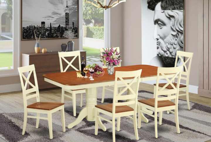 Furnish your home with this specific exquisite 7-Piece Buttermilk & Cherry Dining set and incorporate in it an inescapable charm. The dinette set has a rectangle-shaped table top with a hardwood finish that sets a fascinating contrast against the buttermilk table pedestals and kitchen dining chairs. The chairs provide comfy seating. The table pedestals situated round the center guarantees you have enough room for your legs beneath the table. The neutral shade of the dining set adds splendor and beauty to every kitchen space and dining-room.