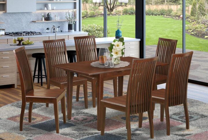 A sturdy table with a versatile appearance and rich color finish is exactly what you'll find here. A traditional design gets a contemporary update in this stylish seven-piece dining set. Made from solid rubberwood