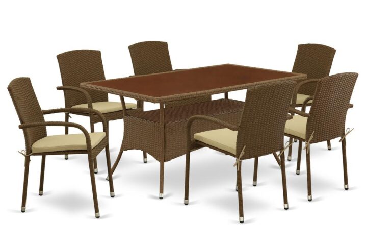 Furnish your patio dining area with this wicker patio set with a Brown finish. This 7 pc OSJU7-02A Outdoor-Furniture set includes an acacia wood top Outdoor-Furniture table and 6 single arm chairs. Constructed from a lightweight steel frame and wrapped with woven resin wicker fiber