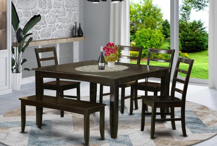 This excellent dining room table set offers a traditional style that includes dining table and dining chairs which you'll find right at your home either in an operational kitchen space or sophisticated dining room. The Dark Cappuccino color are going to harmonize with virtually any decorations and provide a distinct factor to the dining-room or maybe an useful captivation of design cohesion. The dining table and dining room chairs have got a simple and streamlined color with beveled aspects and harmonizing Cappuccino color. The clever dining room chairs have a nice attractive and secure feel which is needed for extended periods of seated conversations at this excellent dining table. The small kitchen table is placed on four reliable corner legs for considerable legroom and individual seating breathing space.