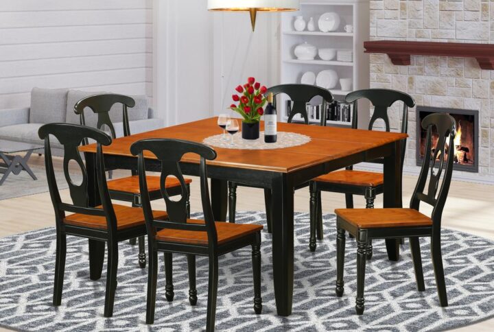 This versatile dining table set may be used in the dining area or kitchen space. It is built completely from solid Asian hardwood featuring polished cherry-colored table tops with beveled edges and fashionable Black frames and legs. The set has a main table and four high-back chairs