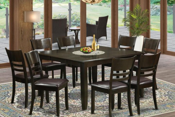 This amazing kitchen table set offers a more traditional look along with dining table and kitchen dining chairs which are right in your own home in either an operational kitchen or formal dining area. The Dark Cappuccino tone is going to accompany virtually any home furnishings and give a supporting aspect towards the dining-room or perhaps an successful captivation of design and style cohesion. The kitchen dinette table and dining room chairs have a relatively easy and modern finish with beveled aspects and Complementing Cappuccino color. The clever dining room chairs have a nice gratifying and comfortable experience that's necessary for the long periods of seated interactions at this valuable dining room table. The kitchen table is connected to four reliable corner posts just for sufficient legroom and also seating breathing space.