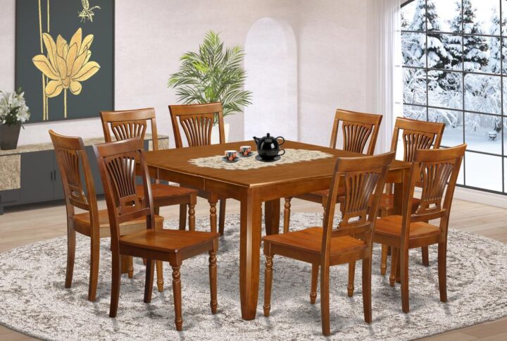 This amazing table and chairs set provides a vintage appearance along with kitchen table and dining room chairs that are right in the house in either an operational new kitchen or formal dining-room. The Dark Saddle Brown tone would certainly match virtually any decor and present a subsidiary element towards the area or maybe an successful immersion of style and design cohesion. The dining room table and dining room chairs have got an easy and streamlined finish with beveled aspects and matching Saddle Brown color. The slick dinette chairs come with a desirable and comfortable sense which is essential for long periods of seated conversations at this valuable dinette table. The kitchen dinette table is connected to four strong corner legs for sufficient legroom and individual seating spaciousness.