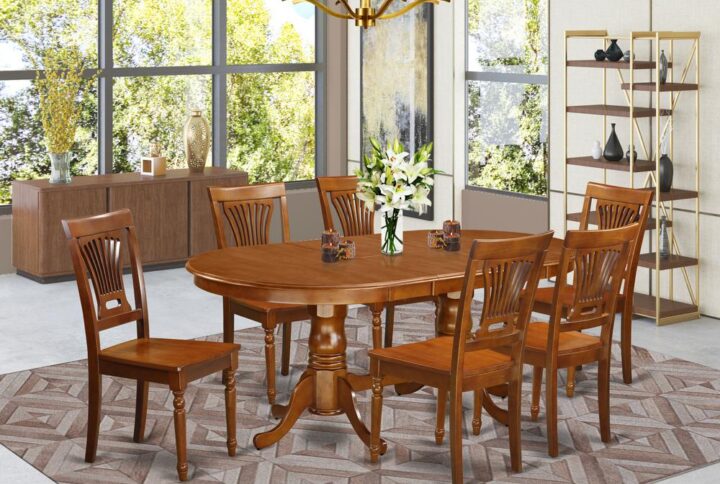This Plainville dining room set boasts a breathtaking finish with a countryside casual impression. Integrating the simple care of a smooth hardwood small kitchen table top with classic fashioned legs for that completely unique appearance. The streamlined oval dining table top