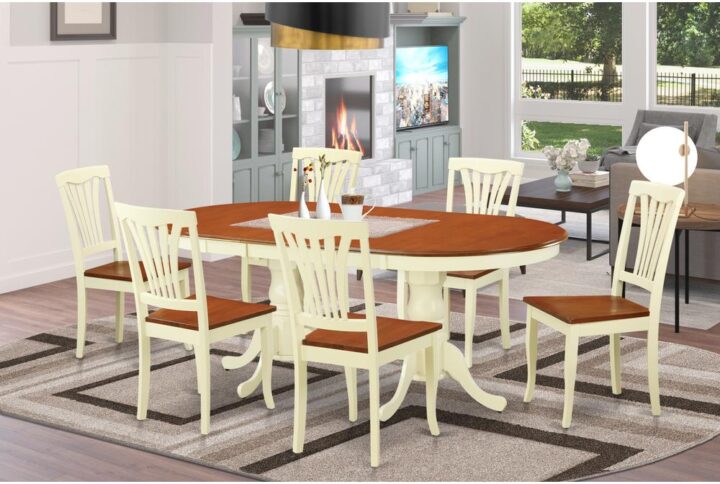 This unique NEWTON dinette set with oval kitchen dinette table and chairs in Buttermilk & Cherry mixes comfort and conservative style to correspond with just about any kitchen. The sturdy