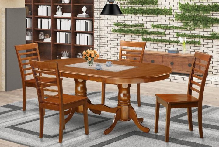 This Plainville dinette table set comes with a wonderful finish which has a countryside laid-back impression. Integrating the easy care of an effortless solid wood dining table top with traditional designed legs for the unique appearance. The streamlined oval kitchen dinette table top
