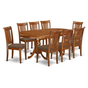 This Plainville dining room table set has an appealing finish with a country laid-back feel. Combining the straightforward care of a smooth hardwood small kitchen table top with traditional styled legs for a personal look. The slick oval kitchen dinette table top