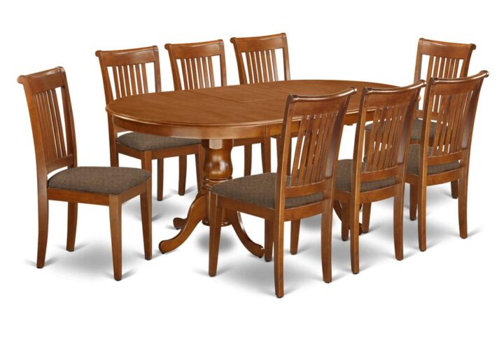 This Plainville dining room table set has an appealing finish with a country laid-back feel. Combining the straightforward care of a smooth hardwood small kitchen table top with traditional styled legs for a personal look. The slick oval kitchen dinette table top