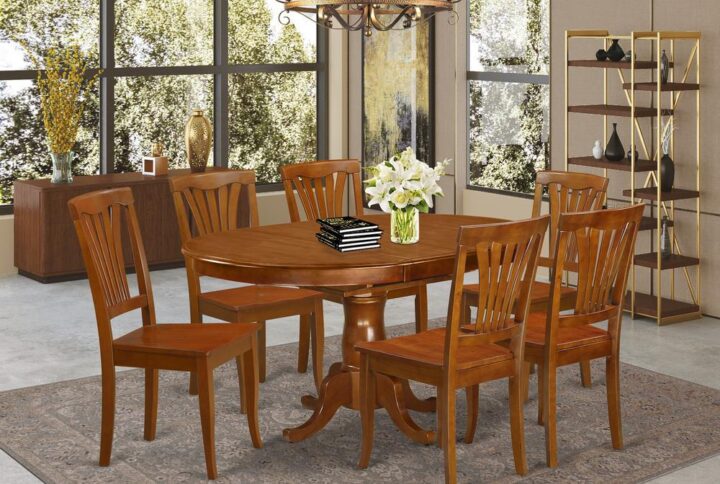 This oval exquisite table and chairs sets match up with any dining-room with rich features and advanced style. These types of table and chairs set features fascination and straight forward style and design for a cozy and peaceful effect with a simple touch of elegance. Exquisite kitchen table set is finished in vibrant Saddle Brown. Oval dining tables featuring convenient 18” butterfly leaf for extra visitors if needed. Good looking ladder back model dining room chairs with either synthetic leather