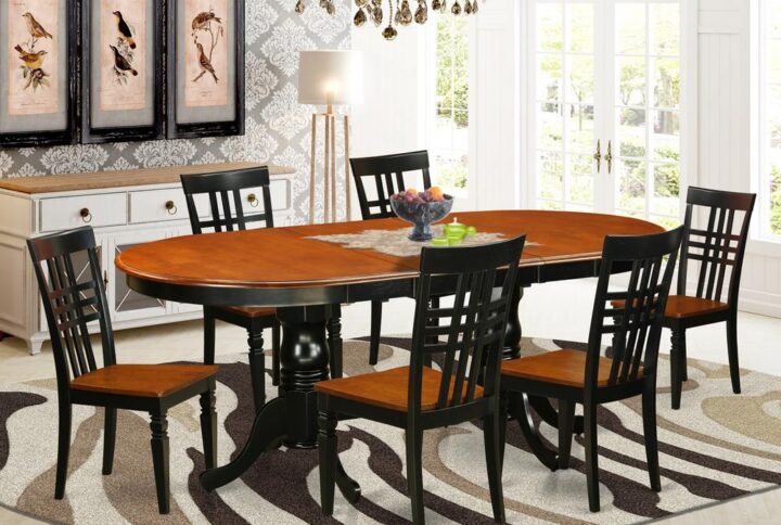 This excellent Plainville kitchen table set with oval dining room tableand chairs in Black & Cherry combines comfortability and conservative style to suit virtually any dining room. The tough