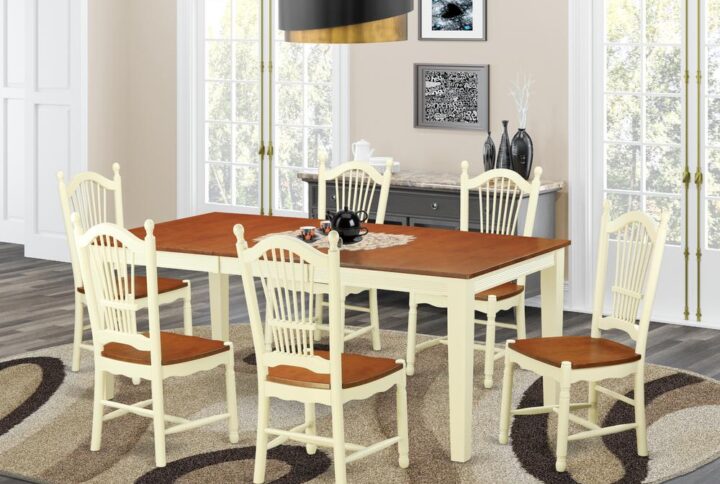 The table and chairs set consists of a small kitchen table and six dinette chairs