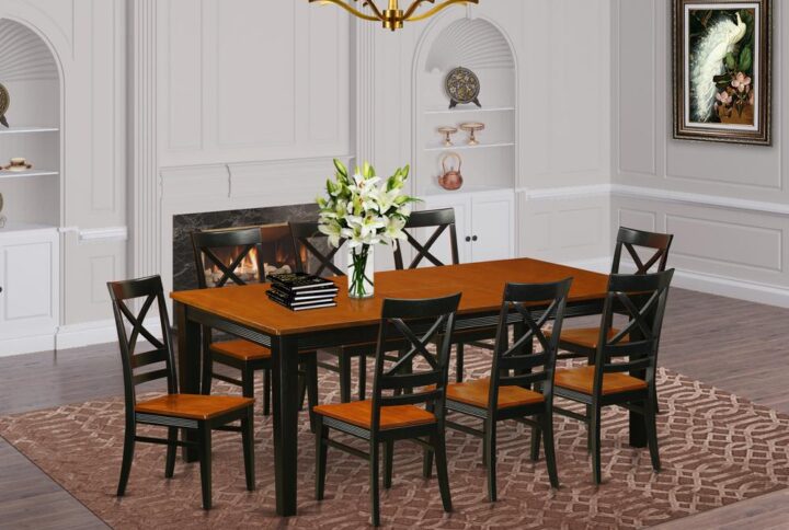 Fashionable four legged dinette set for dining area or eat in kitchen space. Two tone rectangle dining table with brown top and Black legs. High back kitchen chair with soft curves