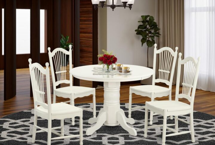 Lighten up a dining area or generate a warm dining space in a small space with this 5 piece dinette set. This set provides a round pedestal table and four sheaf back style kitchen dining chairs. The Linen White finish adds an excellent country cottage or shabby chic look to any dining area or kitchen area. This round table is best for kitchens or dining rooms. Its compact size makes it perfect for apartments