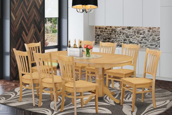This amazing dining table collection features a long oval shaped dining room table containing A pair of pedestals. This modern day looking collection has 8 seats and therefore has an optimal seating capacity of 8 persons. The product features a pleasant