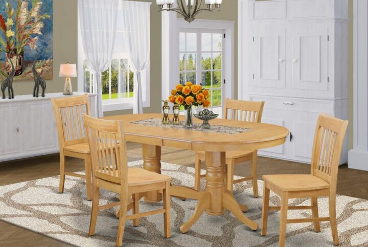 This specific table and chairs set offers a long oval shaped table which has 2 pedestals. This modern-day looking set has 4 seats and therefore has a max seating capacity of 4 persons. This product has a pleasant