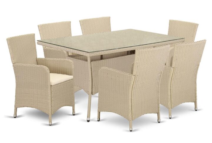 Décor your Outdoor-Furniture patio dining area with this budget-friendly wicker patio set with a cream finish. This 7 pc VLLU7-53V set includes a glass top Outdoor-Furniture table and 6 single armchairs. Crafted from a lightweight steel frame and wrapped with woven Wicker fiber