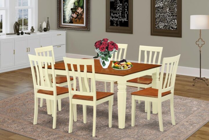 Harmonizing Buttermilk And Cherry Color Wood Dinette Table Set Having Basic Beveled Edge On Trim. Standard Rectangle Dining Table Having 4 Legs. Recessed Details On Kitchen Dinette Table And Dining Room Chair Legs For Added Support And Stylishness. Beveled Chiseling On Legs Of Coordinating Table And Chairs. Small Table Which Has 18 In Self Storage Extension Leaf In Kitchen Space Centre Well Suited For Casual Or Formal Atmosphere. 7 Pc Dining Set With A Single Weston Kitchen Table And 6 Solid Wood Kitchen Chairs Finished In A Rich Two Tone Buttermilk And Cherry Color.