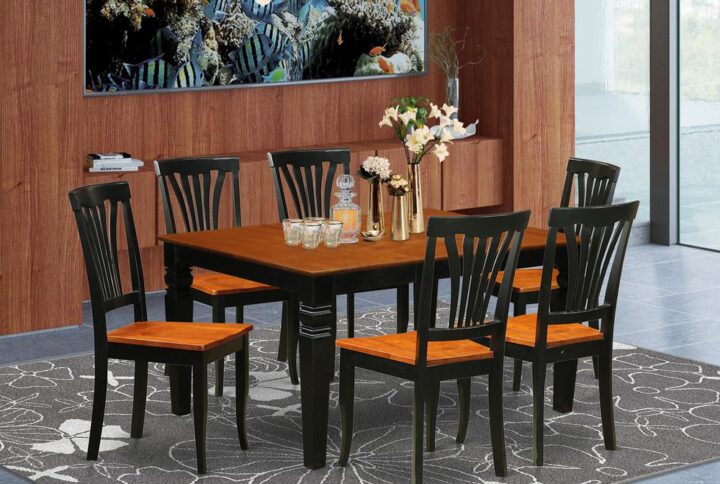Coordinating Black And Cherry Color Hardwood Dinette Set Having Nice Beveled Edge On Trim. Regular Rectangular Small Kitchen Table With Four Legs. Recessed Details On Dining Tables And Dining Room Chair Legs For Extra Support And Elegance. Beveled Carving On Legs Of Coordinating Table And Chairs. Small Dining Table Which Has 18 In Self Storage Extendable Leaf In Kitchen Space Centre Well Suited For Casual Or Formal Atmosphere.  7 Pc Kitchen Set With 1 Weston Kitchen Table And Six Solid Wood Dining Room Chairs Finished In An Elegant  Black and Cherry Color.