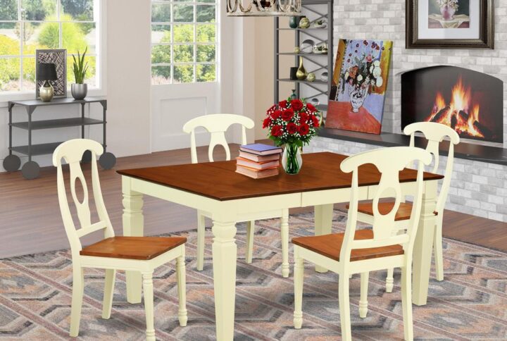 Matching Buttermilk And Cherry Finish Wood Dinette Set Having Nice Beveled Edge On Trim. Regular Rectangular Dining Room Tables Having Four Legs. Recessed Details On Dining Table And Kitchen Dining Chair Legs For Added Support And Attraction. Beveled Carving On Legs Of Harmonizing Table And Chairs. Small Kitchen Table With 18 In Self Storage Extension Leaf In Dining Area Centre Made For Casual Or Formal Atmosphere.  5 Piece Kitchen Set With One Weston Dinning Table And 4 Solid Wood Seat Dining Area Chairs Finished In A Distinctive Two Tone Buttermilk And Cherry Color.