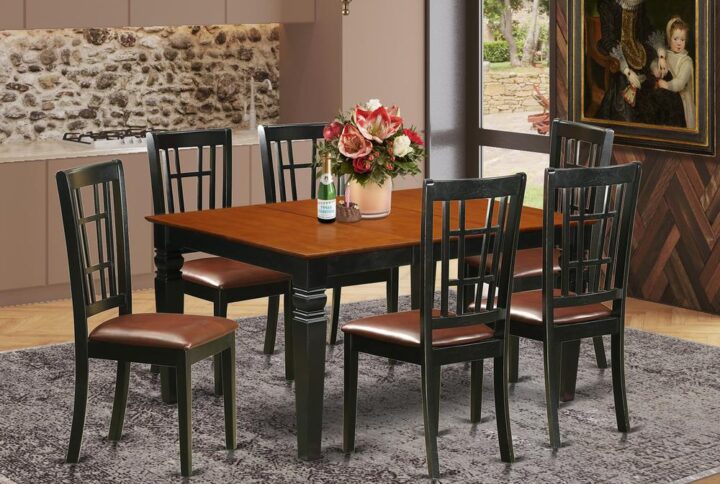 Coordinating Black And Cherry Color Hardwood Dinette Set With Simple Beveled Edge On Trim. Regular Rectangle-Shaped Dining Tables Having Four Legs. Recessed Details On Dining Room Table And Dining Chair Legs For Extra Support And Sophistication. Beveled Chiseling On Legs Of Harmonizing Table And Chairs.  Small Dining Table Which Has 18 In Self Storage Extendable Leaf In Dining Room Centre Made For Casual Or Formal Atmosphere.  7 Pc Kitchen Set With 1 Weston Kitchen Table And 6 Faux Leather Upholstery Dining Chairs Finished In A Luxurious  Black and Cherry Color.