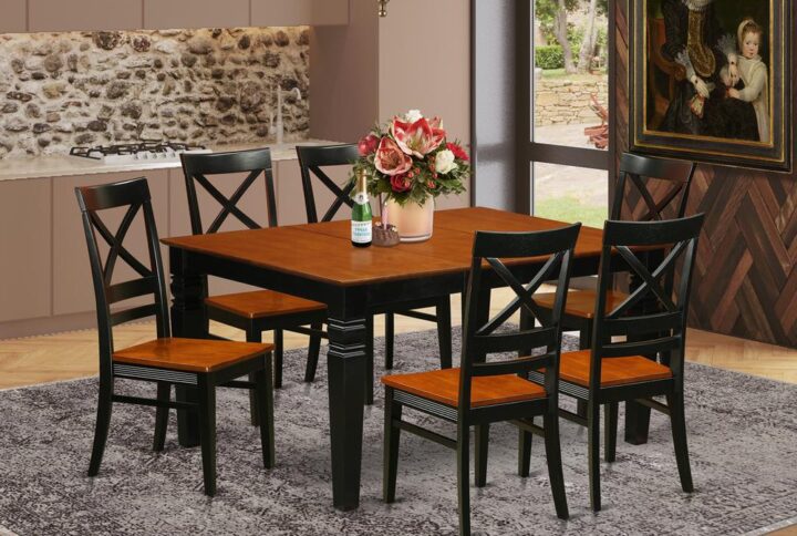 Coordinating Black And Cherry Color Wood Table And Chair Set Having Nice Beveled Table Edge On Trim. Classic Rectangular Small Kitchen Table With Four Legs. Recessed Details On Dining Table And Kitchen Dining Chair Legs For Extra Support And Stylishness. Beveled Chiseling On Legs Of Coordinating Table And Chairs. Dinette Table With 18 In Self Storage Extension Leaf In Dining-Room Centre Suitable For Casual Or Formal Atmosphere.  7 Pc Dining Set With 1 Weston Kitchen Table And Six Wood Dining Chairs Finished In A Distinctive Black and Cherry Color.