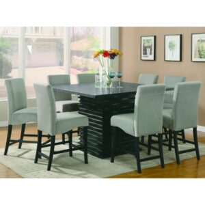 Express modern simplicity with the neutral tones from this five-piece dining set. Constructed of ash veneers