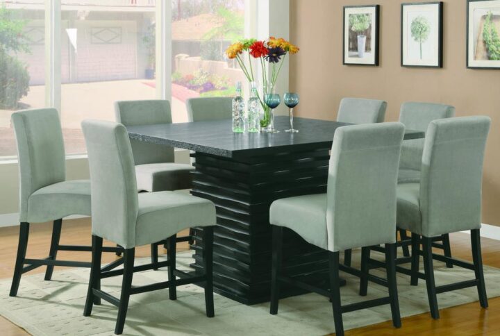Express modern simplicity with the neutral tones from this five-piece dining set. Constructed of ash veneers