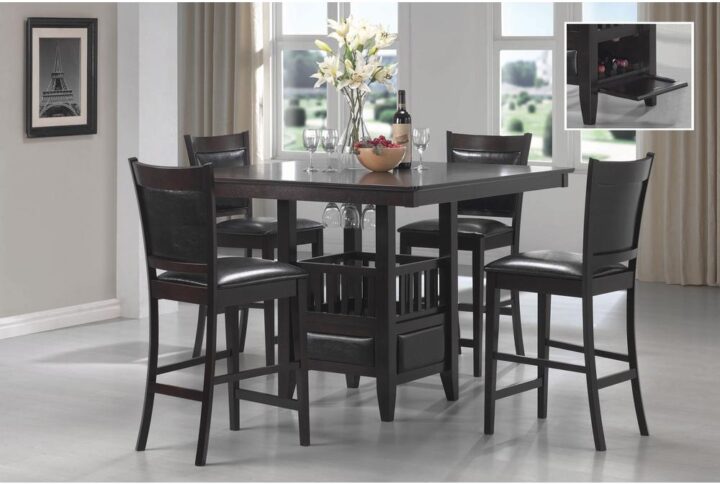 The sophisticated silhouette from this five-piece dining set is compact in size and big in style. Simple and stylish