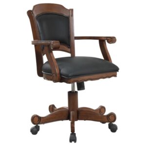 The height of elegance brings romantic character. Dress up an entertainment space with this beautiful game chair. Incredible attention to detail covers all bases with romantic curved accents and scalloped edges. With a tobacco finish and black leatherette seat cover
