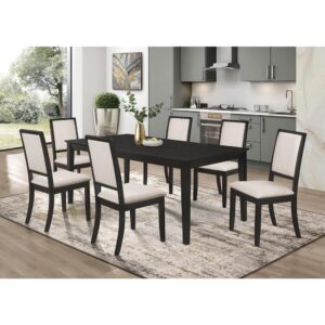 Get a tuxedo-inspired modern dining table set for your home. This seven-piece dining set offers a stark contrast with a black and cream color palette. Made from Asian hardwood and ash veneer
