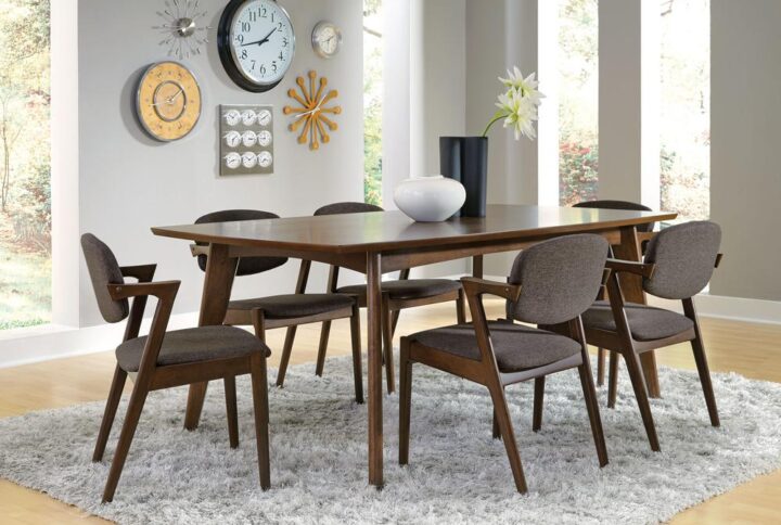 Craft a modern motif with the clean lines and retro-like feel of this five-piece dining set. Mid-century modern design gets a contemporary makeover with overtly angled details. Thin