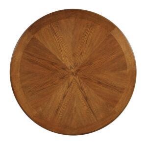 This round wood table from the Nelms Collection looks at home in your casual dining room. Crafted from hardwood and veneers