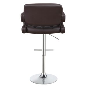 This recreation bar stool is at home at a kitchen island or in the rec room. Chrome stand and base combine with brown upholstery for a unique complement to your decor. Padded armrest makes it easy to relax like in a traditional chair. Raise the seat to get a view of the room or lower it to get lost in your thoughts. A button-tufted diamond pattern design on the backrest gives bar seating a fresh interpretation.